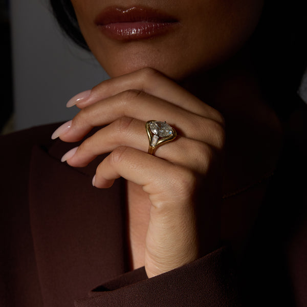 Oval Diamond Chunky Bezel Ring with Tapered Baguettes