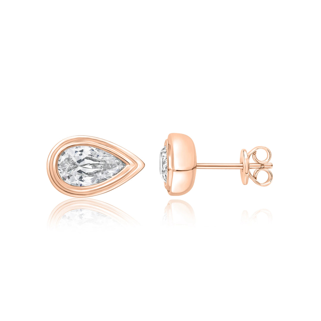 Double Bezel Pear Diamond Earrings