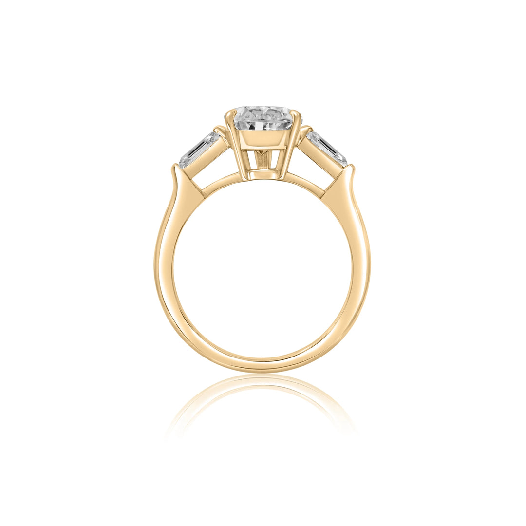 Pear Shaped Diamond with Tapered Baguettes Engagement Ring