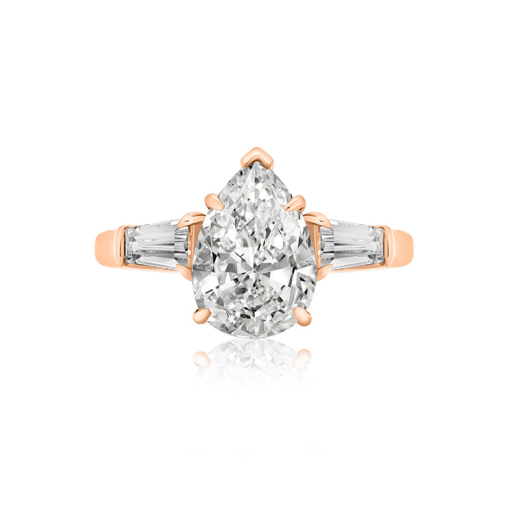 Pear Shaped Diamond with Tapered Baguettes Engagement Ring