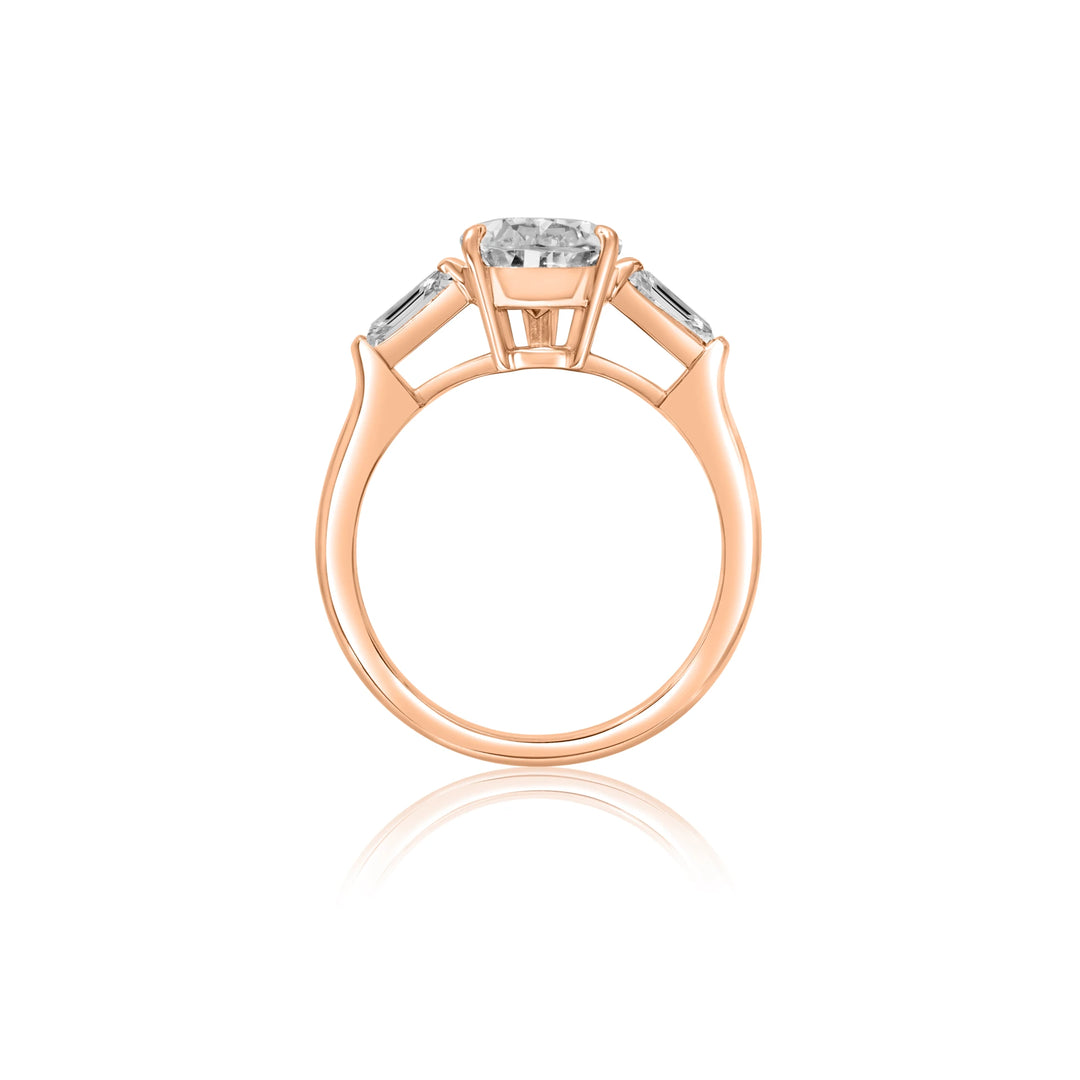 Pear Shaped Diamond with Tapered Baguettes Engagement Ring